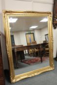 A gilt framed over mantel mirror,