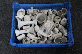 A basket of a quantity of antique tourist china