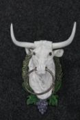 A cast iron bull's head horse hitch