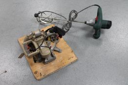 A Performance PCM5210L mitre saw together with a Parkside concrete mixer