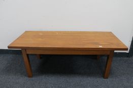 A mid 20th century teak coffee table