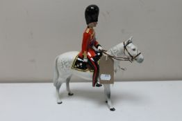 A Beswick figure, H.R.H.