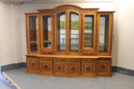 An impressive oriental style high gloss glazed, breakfront bookcase,