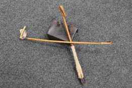 Two riding crops, one with deer's hoof handle,