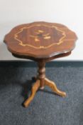 An Italianate pedestal wine table