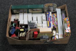 A box containing assorted boxed and unboxed die cast vehicles including Ringtons Transport,