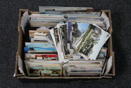 A box of antique and later postcards relating to the North East