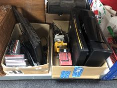 Two boxes containing Kodak printer, Casio camera, Logic 19