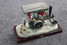 A Juliana Collection figure on wooden base,