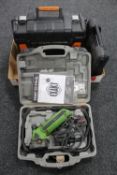 A cased Exact saw together with a cased Parkside soldering iron and a cased Worx angle grinder