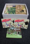 A box of approximately forty-seven Giles cartoon books together with three Fosdyke Saga books