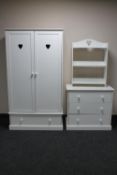 A contemporary white double door wardrobe fitted a drawer with matching three drawer chest and open