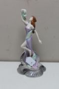 A Coalport Art Nouveau figure; Captivate,