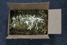 A box of brass crosses