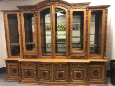 An impressive oriental style high gloss glazed, breakfront bookcase,