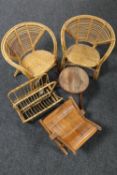 A 20th century bamboo magazine rack together with a pair of similar child's chairs,
