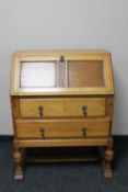 An Edwardian oak bureau