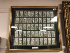 A framed cigarette card montage by Wills - 