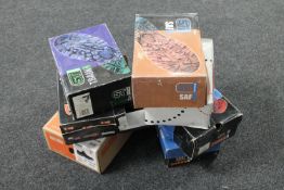 Seven pairs of safety boots in boxes