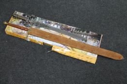 A Scottish style claymore in sheath and a fantasy sword in box