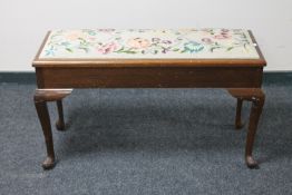 A Queen Anne style tapestry seated duet stool