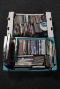 Two boxes of DVD's, CD's,