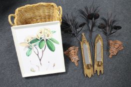 A wicker basket of wall mirrors,