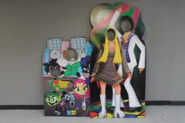 A team titans cut-out stand together with one other