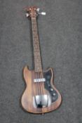 A 1970's Kay bass guitar CONDITION REPORT: Flecks of white paint all over.