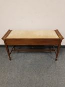 A mahogany duet storage stool,