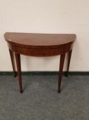 A 19th century inlaid mahogany demi-lune card table,