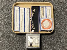 A tray of costume bracelets set with gemstones, two quartz wristwatches,