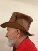 A box of eight leather gent's hats