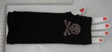 A box of 156 pairs of fingerless skull gloves