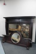 An Edwardian mahogany mirror backed fire surround