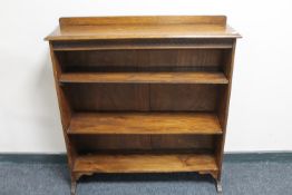 A set of 1930's oak open shelves