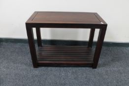 A contemporary hardwood side table
