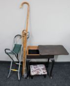 A sewing table, footstool,