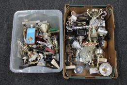Two boxes of darts trophies