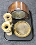 An oak cased Everite mantel clock with silvered dial together with a pair of Eastern brass vases