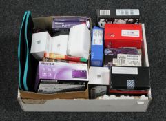 A box of boxed iPhone 4 and iPhone 5C, other empty iPhone boxes, boxed Blackberry smart phone,