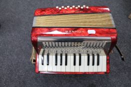 A Hohner Mignon II mini accordion in box