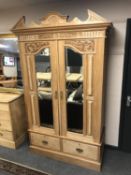 An Edwardian satin walnut double mirror door wardrobe,