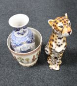 A china figure of a cheetah,