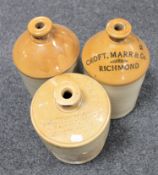 Three antique stoneware flagons marked J. Dawson & Son, Barnard Castle, Croft, Marr & Co.