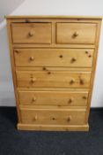 A pine six drawer chest