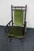 An early 20th century child's American style rocking chair