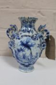 An 18th century Delft pottery blue and white vase