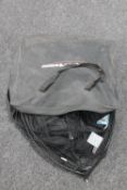 A Superstream bag of fishing and landing nets and spools of line