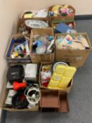 A pallet of nine boxes of assorted bric a brac, glass ware, electricals,